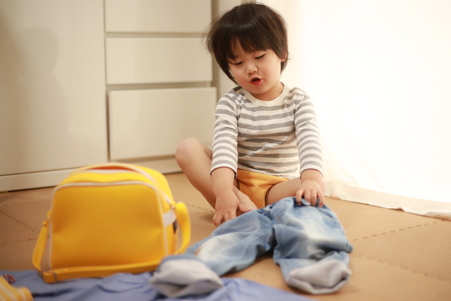 日常生活動作の練習をする子どものイメージ